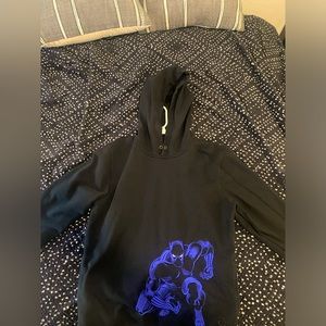 Coach hoodie, sized small (could fit a medium possibly), comfortable material.